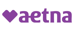 The image displays a logo with the word Aetna in lowercase letters, featuring a purple heart as part of the design.